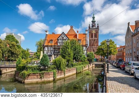 Raduni canal and hanseatic-style Miller's House in the Old Town in Gdansk in summer.