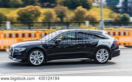 Audi A6 Avant Allroad Quattro C8 Car Driving Fast On City Highway Road. Moscow, Russia - August 2021