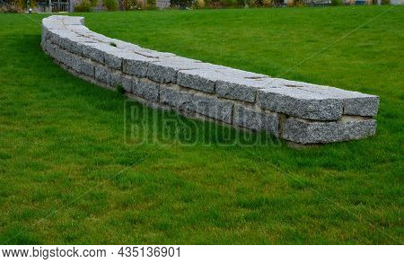 Granite Walls Made Of Stone Blocks Serve As Design Elements, Retaining Walls, Or Seating Areas, Seat
