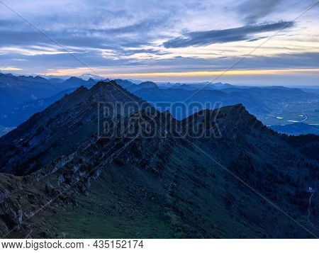 View From The Speer Mountain Peak In The Toggenburch Towards Federispitz And The Glarus Alps. Sunset