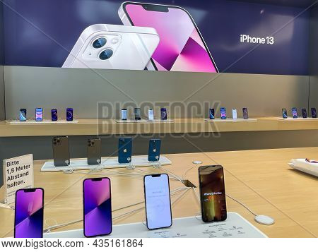 Cologne, Germany - October 01st 2021: A German Photographer Comparing And Testing The New Iphone 13 