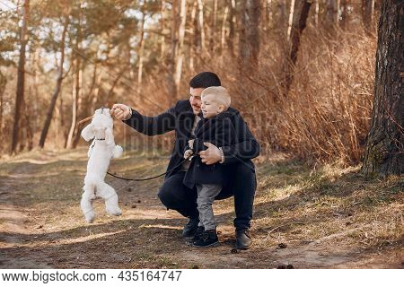 Cute Family Playing In A Summer Park
