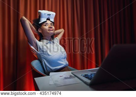 American Woman Is Spending Time At Workplace