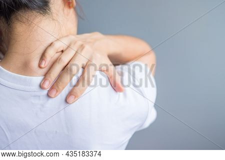 Woman With Her Shoulder Sprain, Muscle Painful During Overwork. Girl Having Body Problem After Wake 