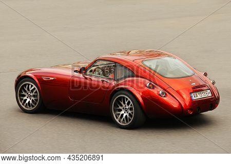 Kiev, Ukraine - June 12, 2021: Wiesmann Gt Mf4. Sports Red Exclusive Car On The Road