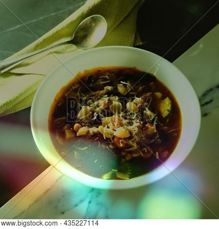 Classic Italian Minestrone Soup With Vegetables Beans And Pancetta Stylized To Look Vintage Or Retro