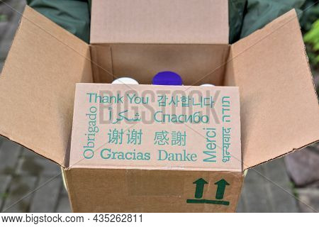 Parcel With Text Thank You In Different Languages. Thank You Inscription In Different Languages On T
