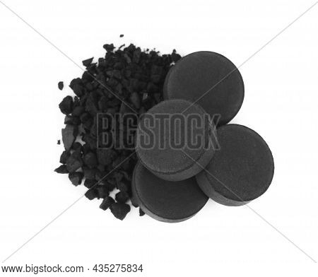 Activated Charcoal On White Background, Top View. Potent Sorbent