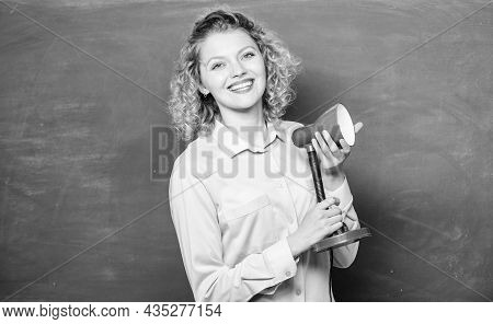 Proper Light Classroom. Light Up Process Of Studying. Teacher Woman Hold Table Lamp Chalkboard Backg