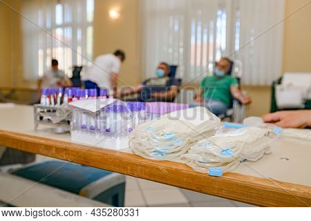 Pile Of Empty Clean Blood Bags And Tube Test For Research Laboratory Placed In Rack To Take On Analy