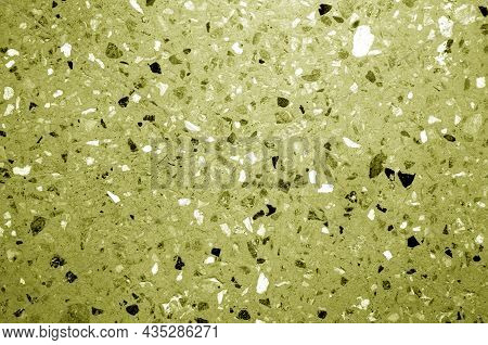 Cement Plate With Small Gravel Stones In Yellow Tone. Abstract Background And Texture For Design.