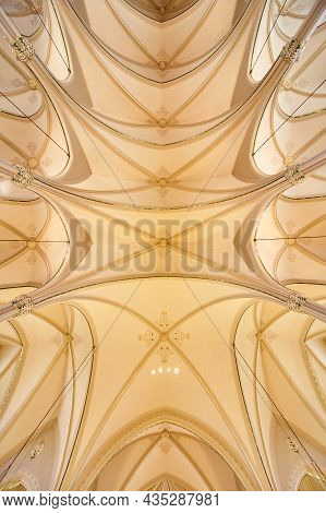 Worms Eye View Of The White Vaulted Ceiling Of The Cathedral