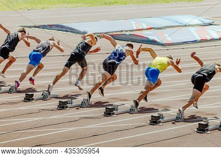 Start Group Of Male Athletes 100 Meters Race