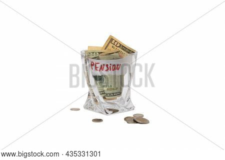 A Pile Of Dollars In A Whiskey Glass On A White Isolated Background. Retirement Savings In Dollars. 