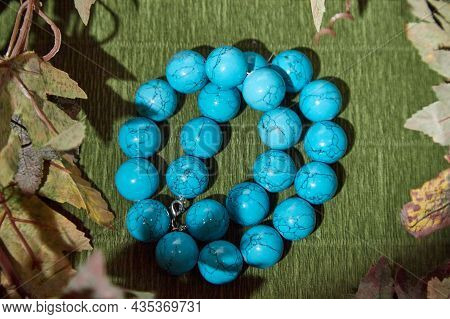 Beautiful Blue Beads. The Concept Of A Beautiful, Elegant Life And Beautiful Decoration For Woman