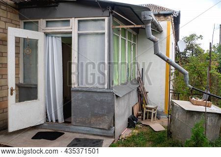 Entrance To Typical Home Of Poor Family In Eastern Europe Or Post-soviet Space. Rural Residential Bu