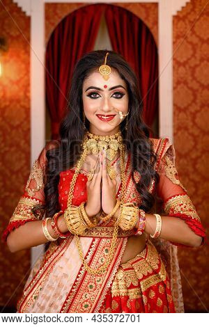 Portrait Of Very Beautiful Young Indian Lady In Luxurious Costume With Makeup And Heavy Jewellery Po