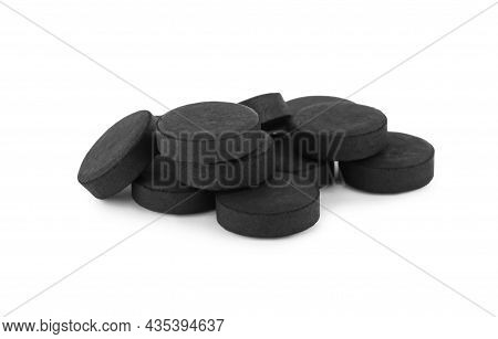 Activated Charcoal Pills On White Background. Potent Sorbent