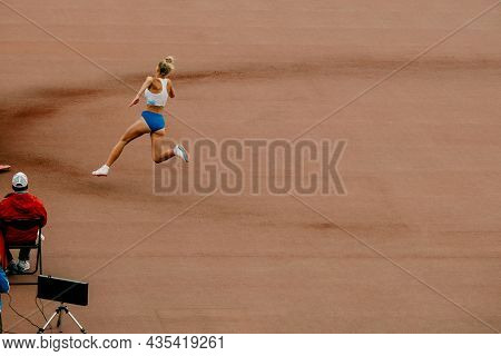 Girl Jumper Running Up Before In High Jump