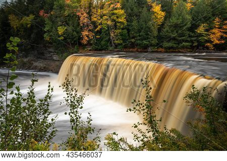 Upper Tahquamenon Falls Closeup Waterfall Photo In Upper Michigan With Water Cascading Into The Rive