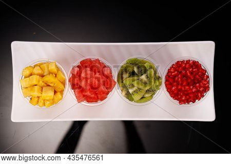 Watermelon , Pineapple  , Pomegrenate And Kiwi