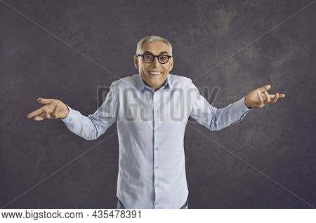 Senior Man Shrugs Shoulders To Show That He Doesnt Remember Or Doesnt Know Anything