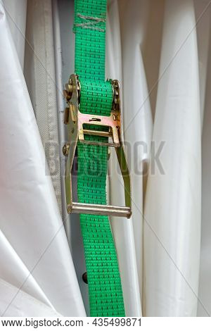 High Strength Strap With Ratchet Tying And Securing Load For Transport