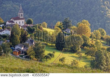 The Small Mountain Village Of Venon And Its Church Among The Meadows