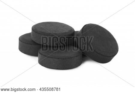 Activated Charcoal Pills On White Background. Potent Sorbent