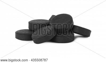 Activated Charcoal Pills On White Background. Potent Sorbent