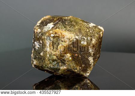 Macro Mineral Stone Andradite On A Black Background Close-up