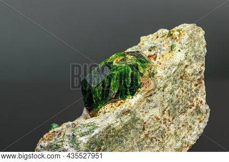Macro Mineral Stone Andradite On A Black Background Close-up