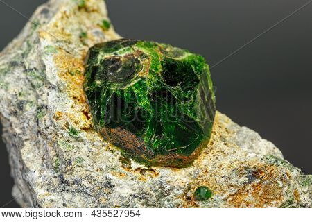 Macro Mineral Stone Andradite On A Black Background Close-up