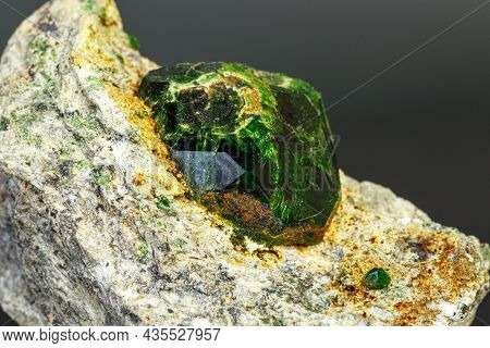 Macro Mineral Stone Andradite On A Black Background Close-up