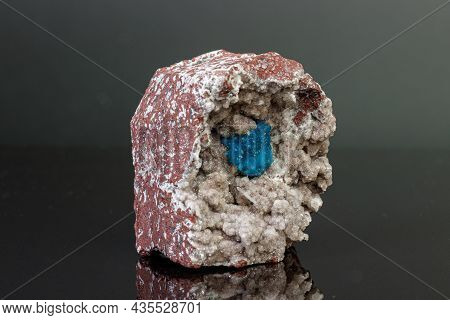 Macro Mineral Stone Cavansite On A Gray Background Close-up