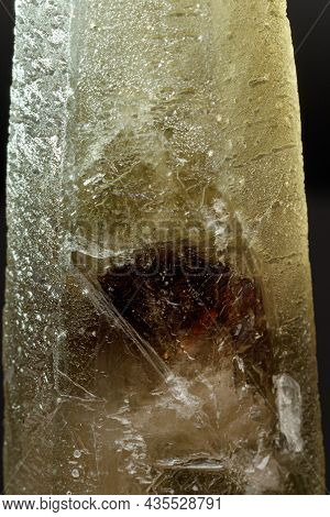 Macro Mineral Stone Prase With Amethyst Phantom On A Gray Background Close-up
