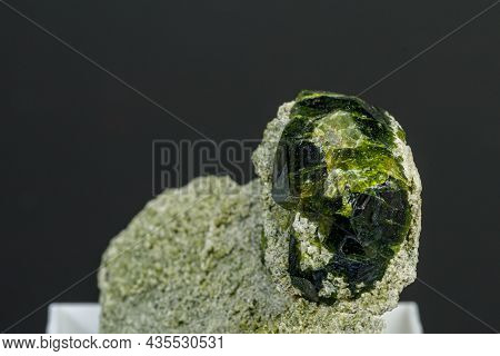 Macro Mineral Stone Andradite On A Black Background Close-up