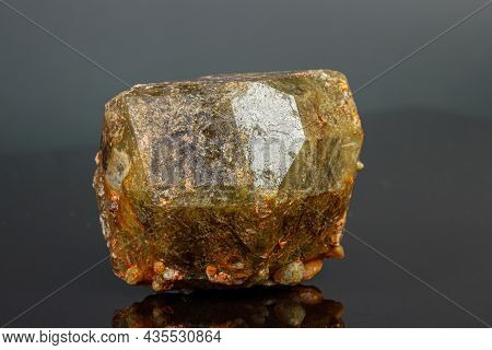 Macro Mineral Stone Andradite On A Black Background Close-up
