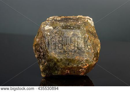 Macro Mineral Stone Andradite On A Black Background Close-up