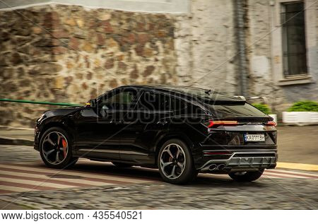 Kiev, Ukraine - June 12, 2021: Black Luxury Super Suv Lamborghini Urus In Motion. Lamborghini Urus S
