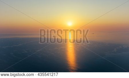Sunrise Over Calm Sea. Dawn Over Horizon, Ocean, Water - Timelapse Or Hyperlapse. Solar Path On Wate