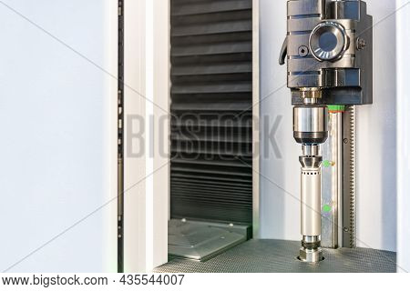 Cylindrical Metal Workpiece During Setup On High Technology And Precision Optical Measuring Machine 