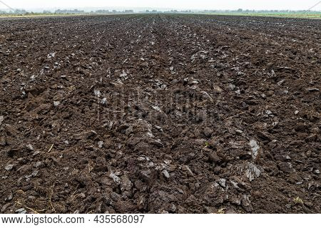 Freshly Plowed Soil Field In The Foggy Morning - Close Wide Angle View With Edge-to-edge Sharpness, 