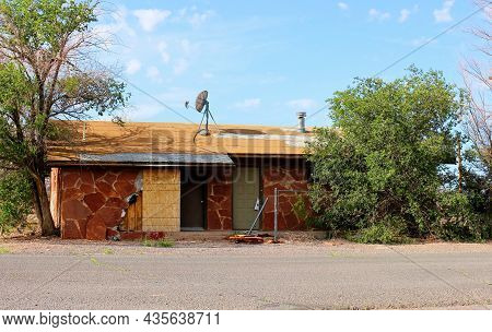 Abandoned One Story House In Need Of Repair