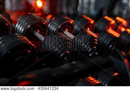 Gym Training Heavy Weights On Stacks. Fitness Workout Row Of Weights ...