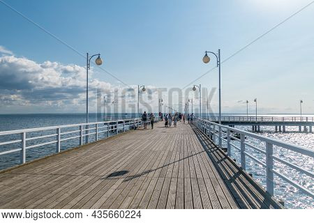 Jurata, Poland - July 20, 2021: Jurata Pier With Tourists On Baltic Sea. Jurata Is A Popular Polish 