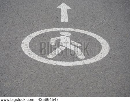 Circular White Traffic Sign. Asphalt Road For Pedastrians Marked With Special Sign. White Pedestrian