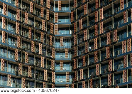 Ajman, United Arab Emirates - May 17, 2021: Building Of Wyndham Garden Corniche Hotel In Sunny Day. 