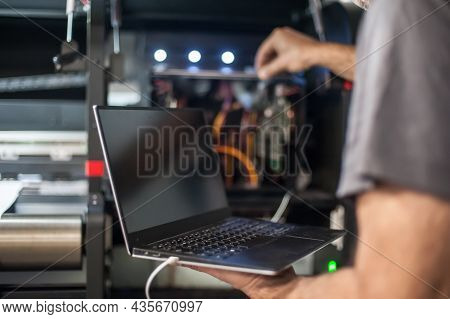 Engineer Technician Electrician Inspect System With Laptop Computer. Electric Installation
