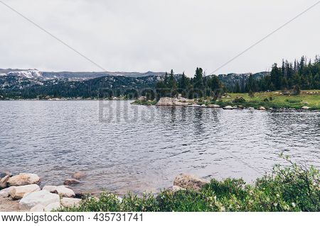 Island Lake On The Beartooth Highway Road In Montana, On A Stormy, Overcast Summer Day
